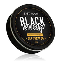 My Store East Moon black soap bar shampoo in a natural black soap bar, showcasing its dark, textured surface for hair cleansing.