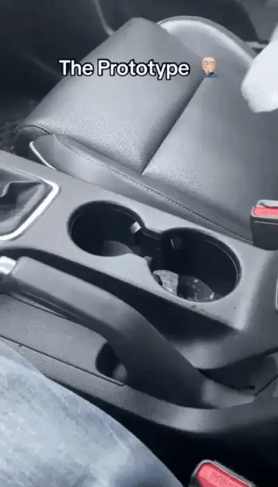 Smart Car Cup Warmer by My Store, showing a close-up of the device warming a coffee cup in a car.