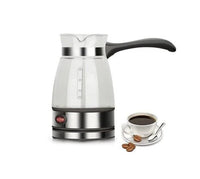 My Store ZK Electric Water Kettle with stainless steel body and black handle, boiling water on a kitchen countertop.